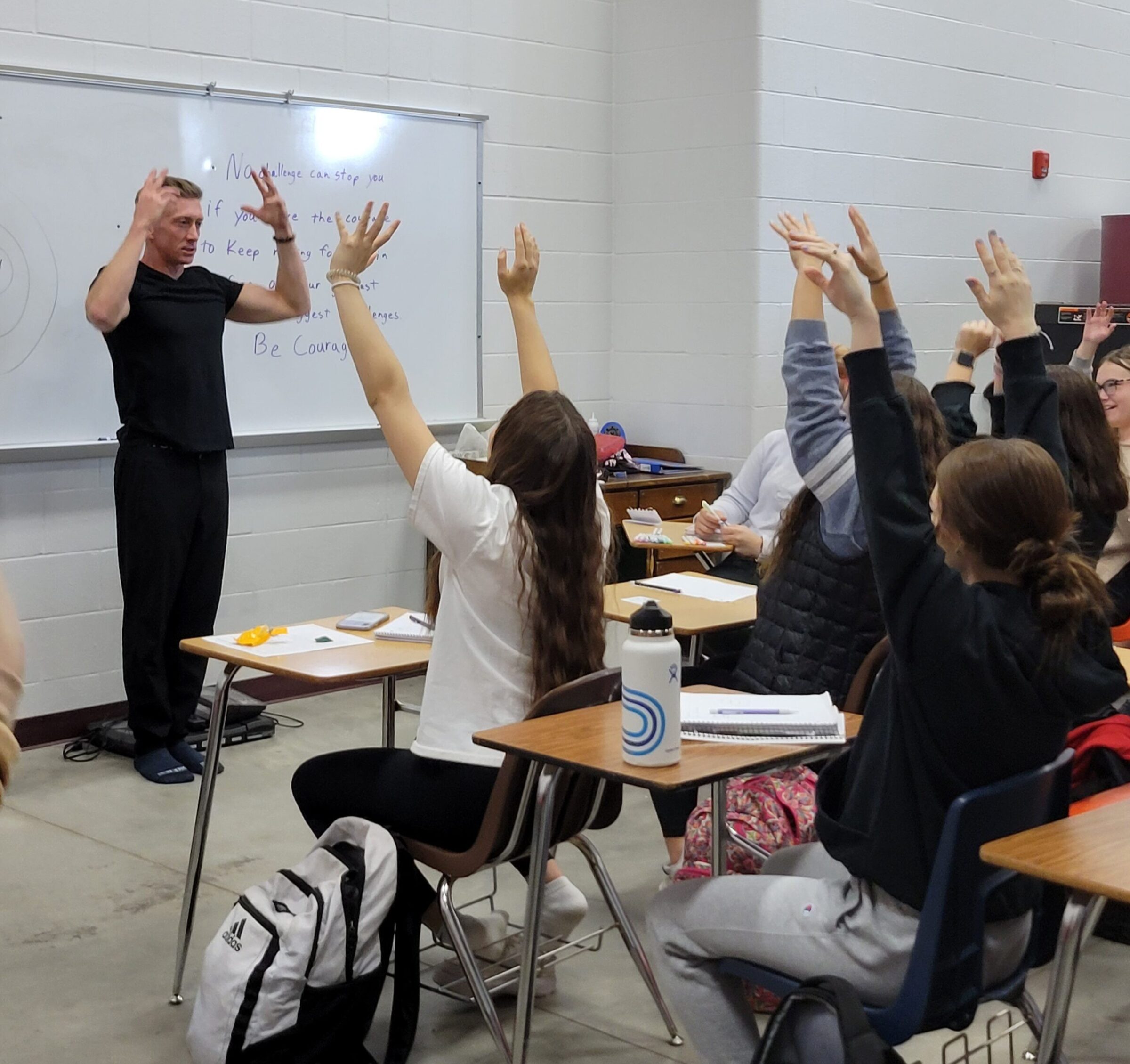 Josh, a breathwork teacher at Spearfish High School, teaches exercises to students in 2025.